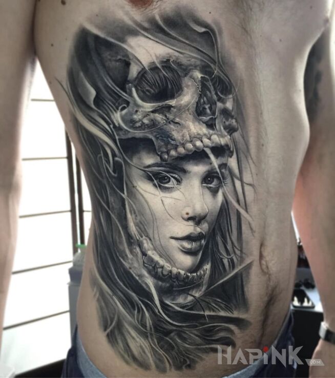 Tattoo Dziewczyna w czaszce in characters motif and realistic style on the stomach