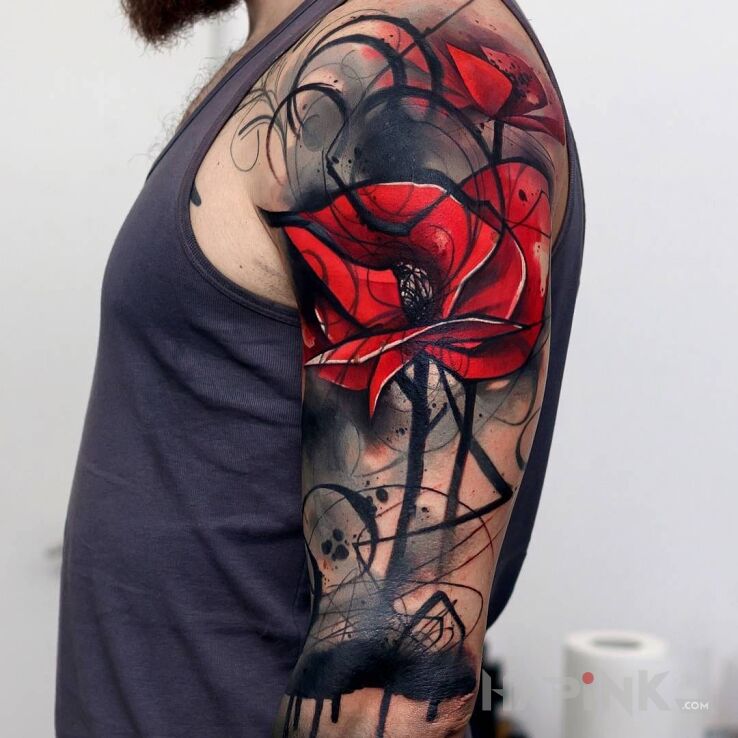 Tattoo Abstrakcyjny kwiat  in flowers motif on the upper arm