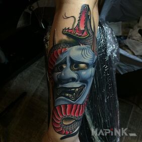 Tattoo Demon mask on the forearm motif: animals