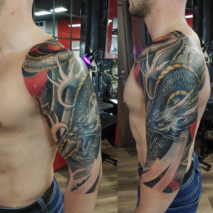 Tatuaż smok w motywie ornamenty i stylu graficzne / ilustracyjne na bicepsie
