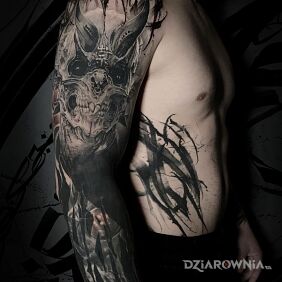 Tatuaż Czarne oczy diabła na ręce motyw: rękawy styl: blackwork / blackout