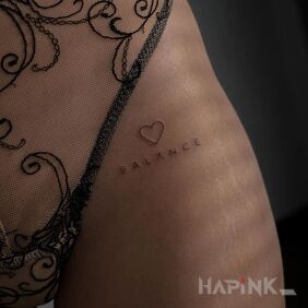 Tattoo Balance on the hip motif: lettering style: minimalistic