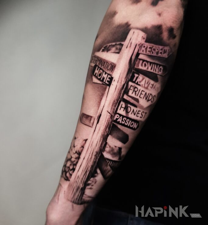 Tattoo DROGOWSKAZ in 3D motif and realistic style on the forearm