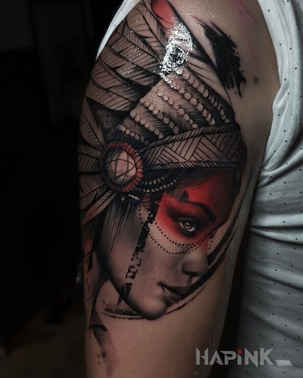 Tattoo INDIANKA in Indian motif and realistic style On the arm