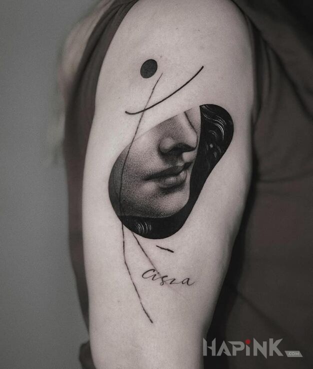 Tattoo CISZA in lettering motif and realistic style On the arm