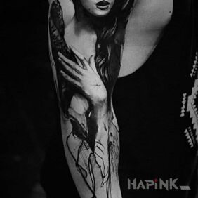 Tattoo Woman on the upper arm motif: characters style: realistic