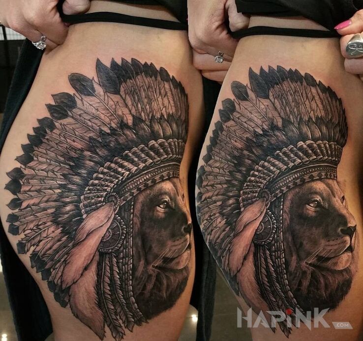 Tattoo Lew in 3D motif and realistic style on the leg