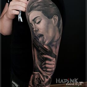 Tattoo Gun instead of a lollipop On the arm motif: objects style: realistic