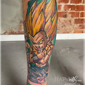 Tattoo Maciek on the leg motif: colorful style: cartoon / comic book