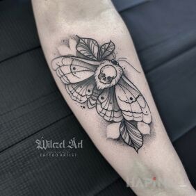 Tattoo Moth / Skull / Leaves On the arm motif: skulls style: graphic / illustrative