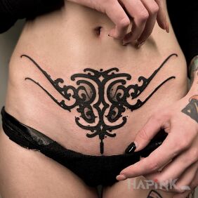 Tattoo Black symbol on the stomach motif: other style: blackwork / blackout