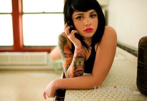 Tattoo Czarnulka z wytatuowana reka in sleeves motif on the forearm