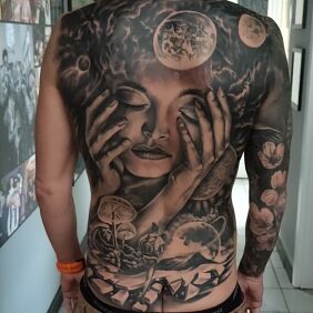 Tattoo Running through life on the back motif: fantasy style: realistic