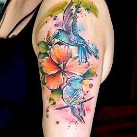 Tattoo Hummingbirds On the arm motif: colorful style: Watercolor