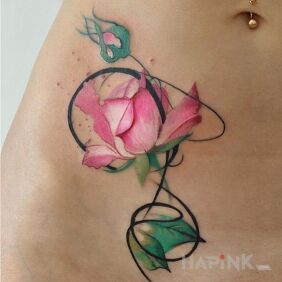 Tattoo Rose on the stomach motif: flowers