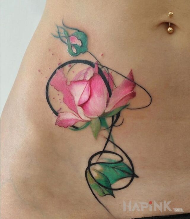 Tattoo Różyczka in sexy motif on the stomach