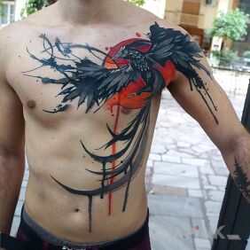 Tattoo Black bird on the chest motif: animals