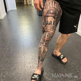 Tattoo Leg with Jesus on the leg motif: lettering style: graphic / illustrative