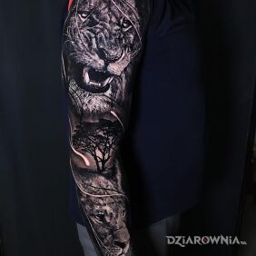 Tatuaż Lew i lwica na ręce motyw: czarno-szare styl: realistyczne