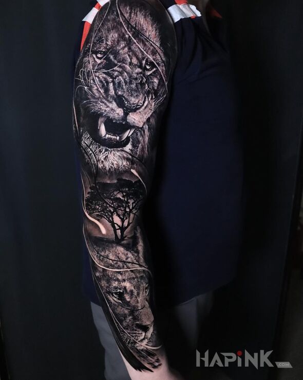 Tattoo Lew i lwica in 3D motif and realistic style On the arm