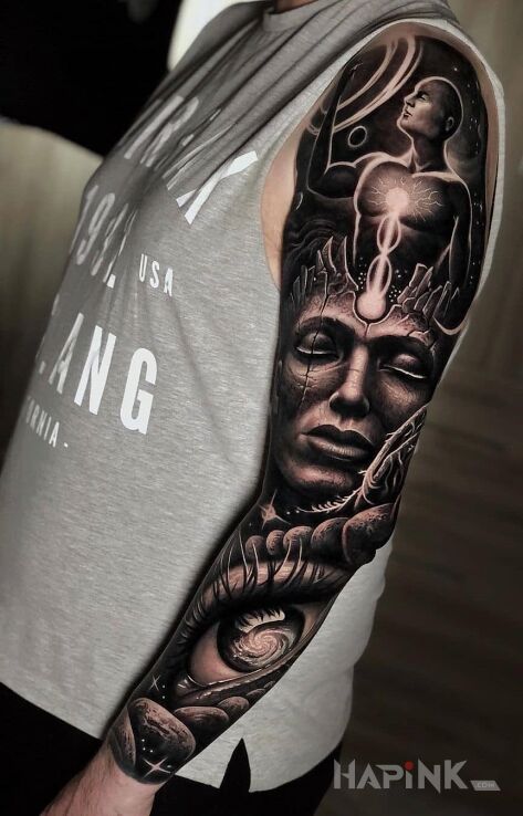 Tattoo Oświecony w kosmosie in sleeves motif and realistic style on the forearm