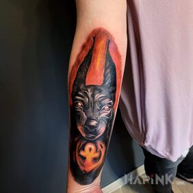 Tattoo Anubis On the arm motif: characters style: graphic / illustrative