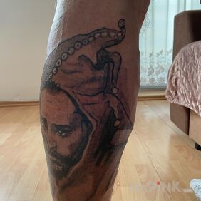 Tattoo Jester by Jan Matejko on the calf motif: black and gray style: realistic