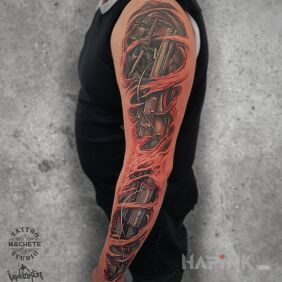 Tattoo Biomechanical hand on the forearm motif: sleeves style: biomechanics