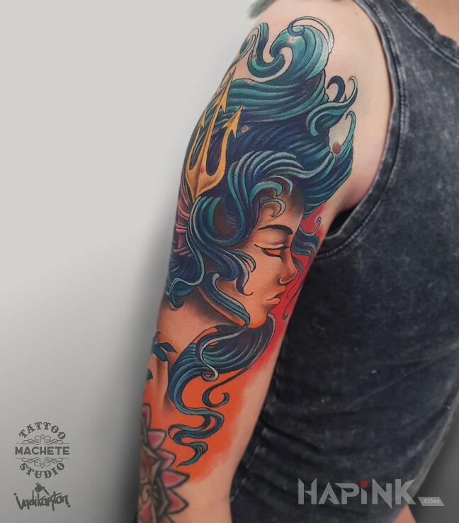 Tattoo Stworzenie morskie z trójzębem we włosach in faces motif and neo-traditional style on the upper arm