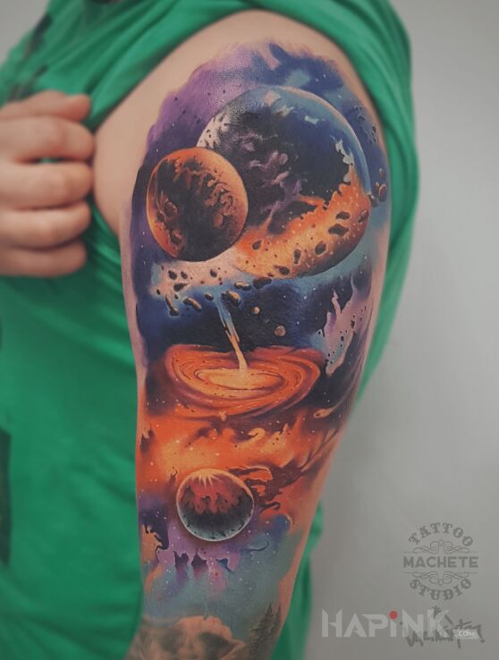 Tattoo Galaktyka in cosmos motif and realistic style On the arm