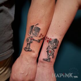 Tattoo Robot in love with a red heart On the arm motif: Love style: graphic / illustrative