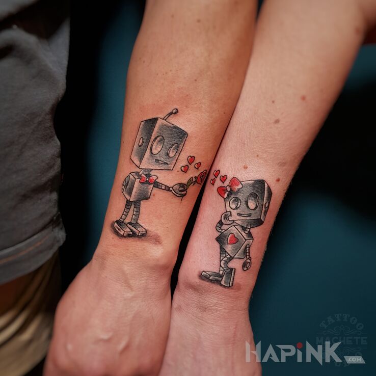 Tattoo Robot zakochany w czerwonym sercu in colorful motif and graphic / illustrative style on the wrist