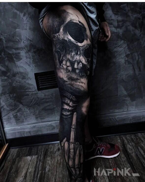 Tattoo Fuckers od kościotrupa in black and gray motif and realistic style on the leg