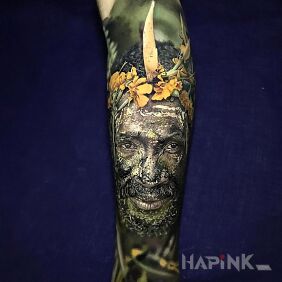 Tattoo A realistic portrait of a bushman on the forearm motif: 3D style: realistic