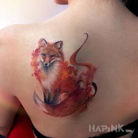 Tattoo Fox on the shoulder blades motif: colorful style: Watercolor