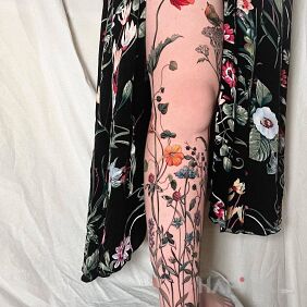 Tattoo Leg with wild flowers on the thigh motif: flowers style: realistic