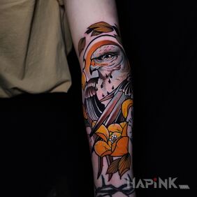 Tattoo Rough-legged buzzard On the arm motif: flowers style: neo-traditional