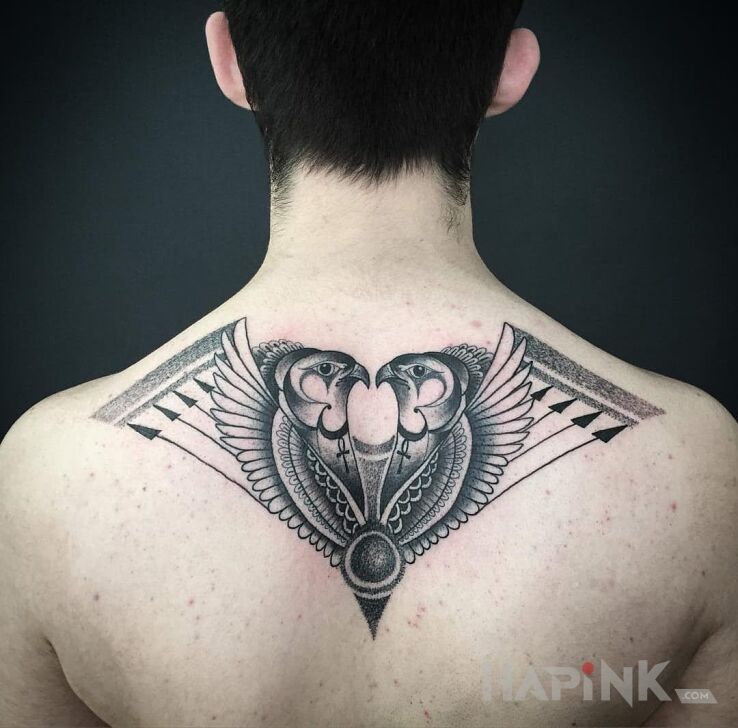 Tattoo Egipt in religious motif on the back
