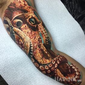 Tattoo Realistic octopus on the forearm motif: animals style: realistic
