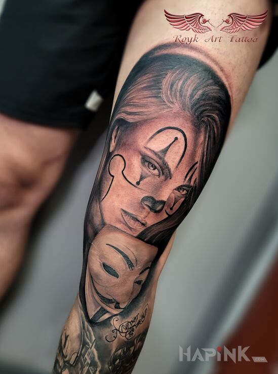 Tattoo Chicano tattoo in faces motif and chicano style on the thigh