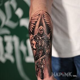 Tattoo Realistic Angel On the arm motif: black and gray style: realistic