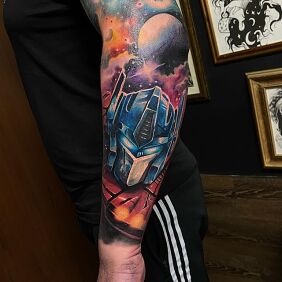 Tattoo Optimus Prime on the forearm motif: cosmos style: realistic