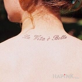 Tattoo Short caption on the nape motif: lettering