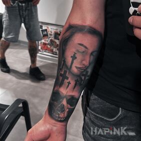 Tattoo Graveyard theme On the arm motif: faces style: realistic