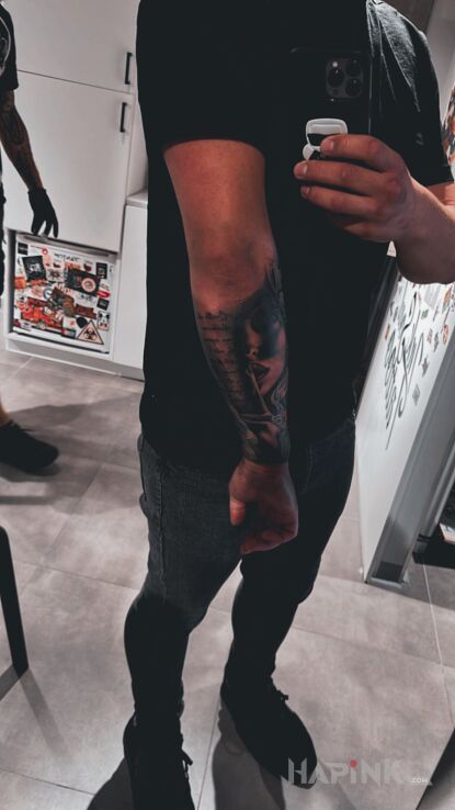 Tattoo Kobieta z palcem na ustach in black and gray motif and realistic style On the arm