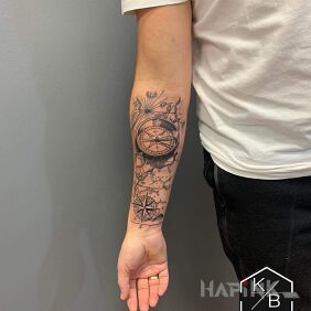 Tattoo Map on the forearm motif: objects style: realistic