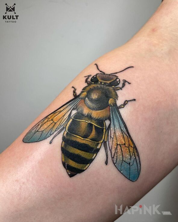 Tattoo OWAD in insects motif and realistic style on the forearm