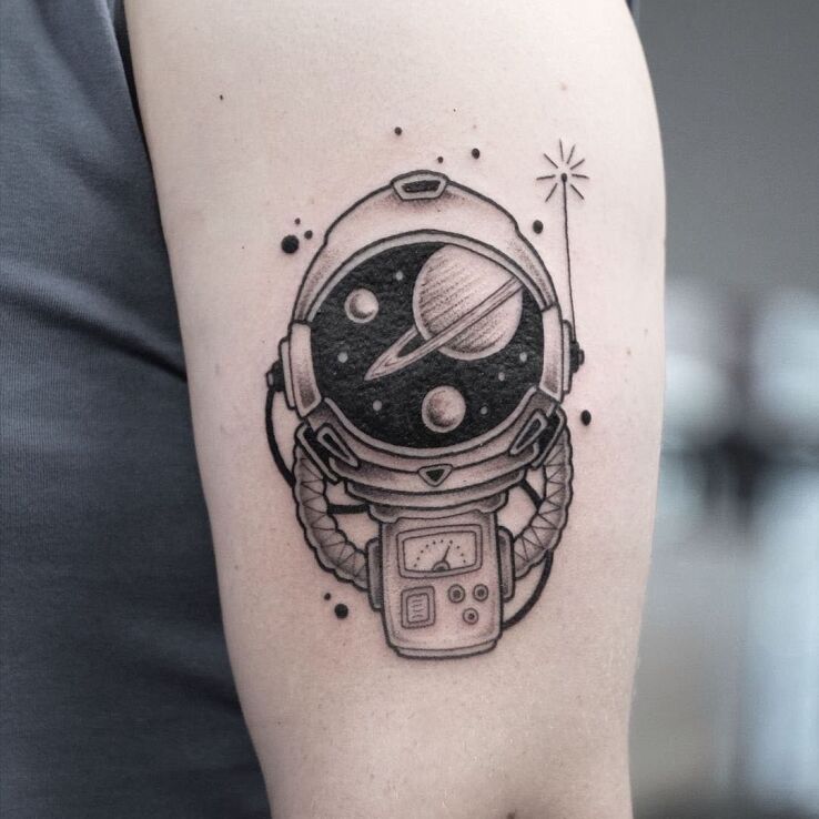 Tattoo ASTRONAUT in science fiction motif and graphic / illustrative style On the arm