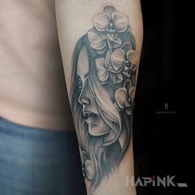 Tattoo Girl On the arm motif: faces style: realistic
