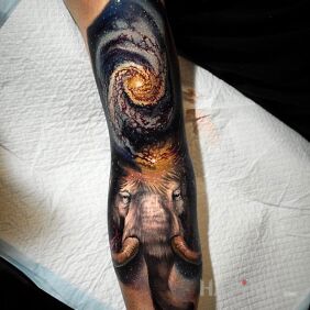 Tattoo Mammoth on the upper arm motif: animals style: realistic